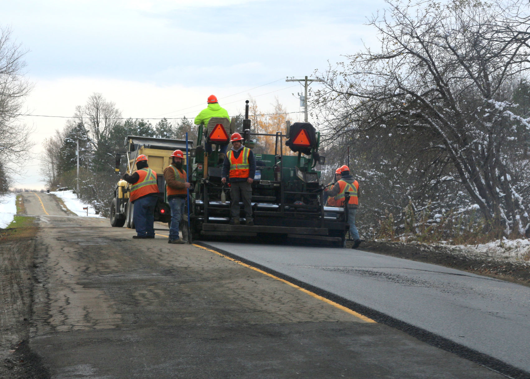 County DPW paving East Otto road Monday after weekend snowfall